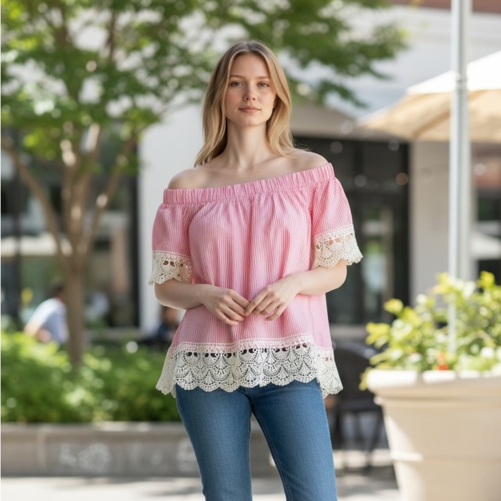 Romeo & Juliet Couture off shoulder blouse.Size M.